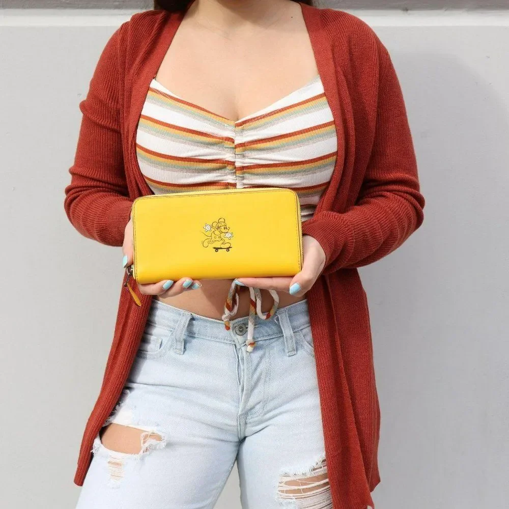 New Coach Disney Mickey Riding Skateboard Accordion Zip Wallet Banana Yellow - Picture 2 of 12